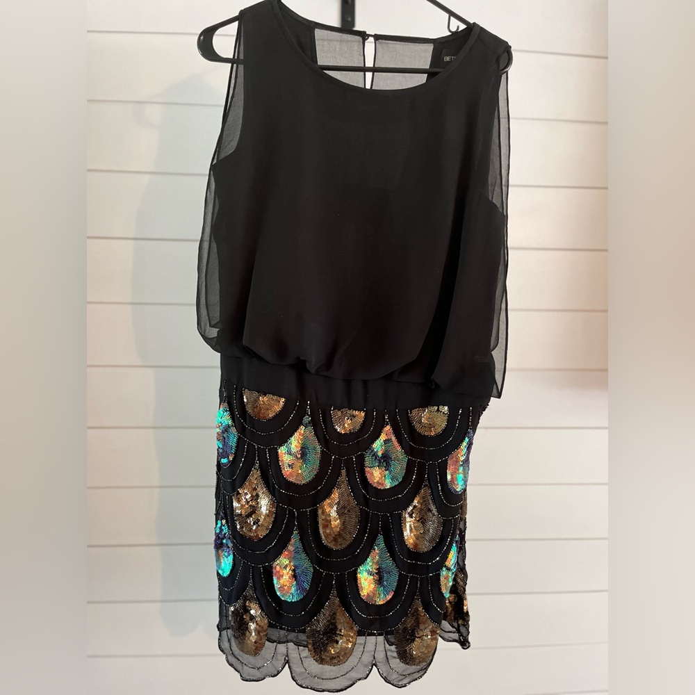 Betsy Adams, size 6